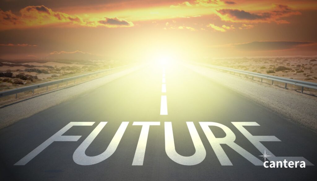 道路の先に「FUTURE」と描かれその先にまぶしい光が広がる「未来へと進む姿」そのもの
